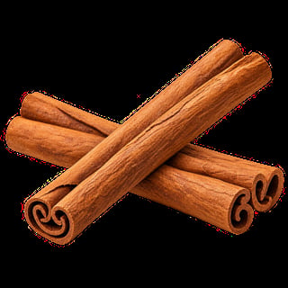 Cinnamon sticks arranged in a cross pattern on a black background